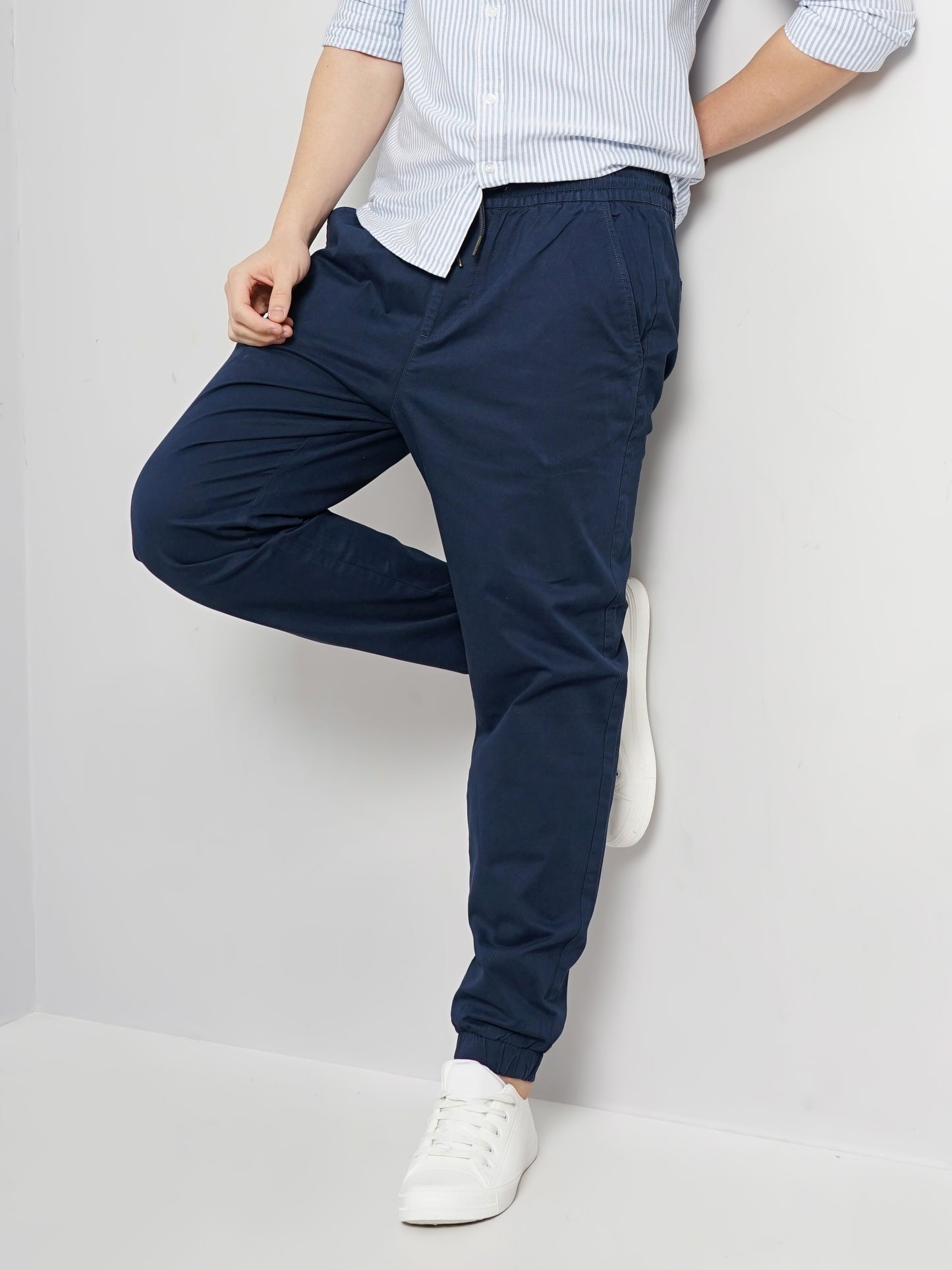 Celio* Men Blue Solid Jogger Fit Cotton Trousers