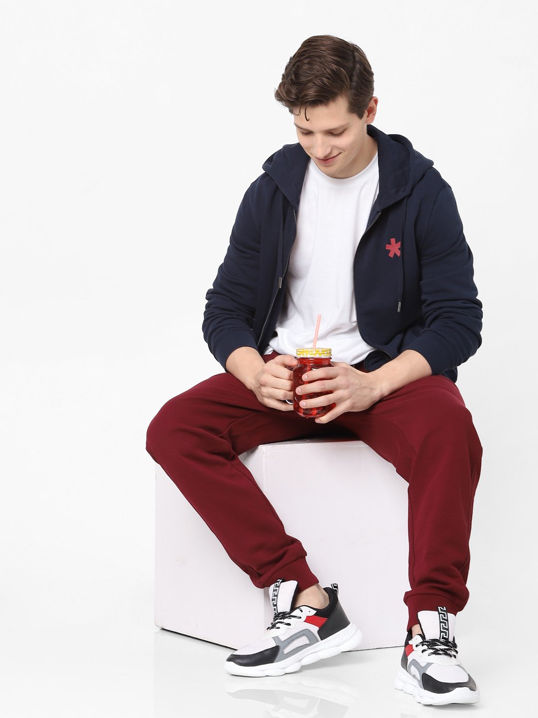 Celio* Men Burgundy Solid Jogger Fit Cotton Trousers