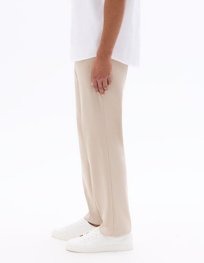 Celio Solid Loose Fit Poly-Blend Beige Trousers