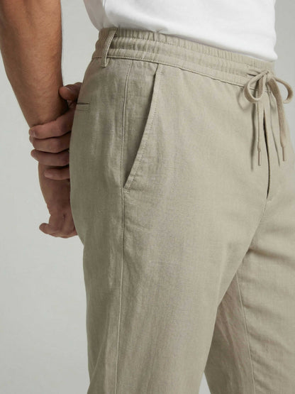 Celio* Men Beige Solid Regular Fit Polyester Trousers