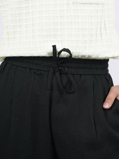 Celio* Men Black Solid Loose Fit Viscose Trousers