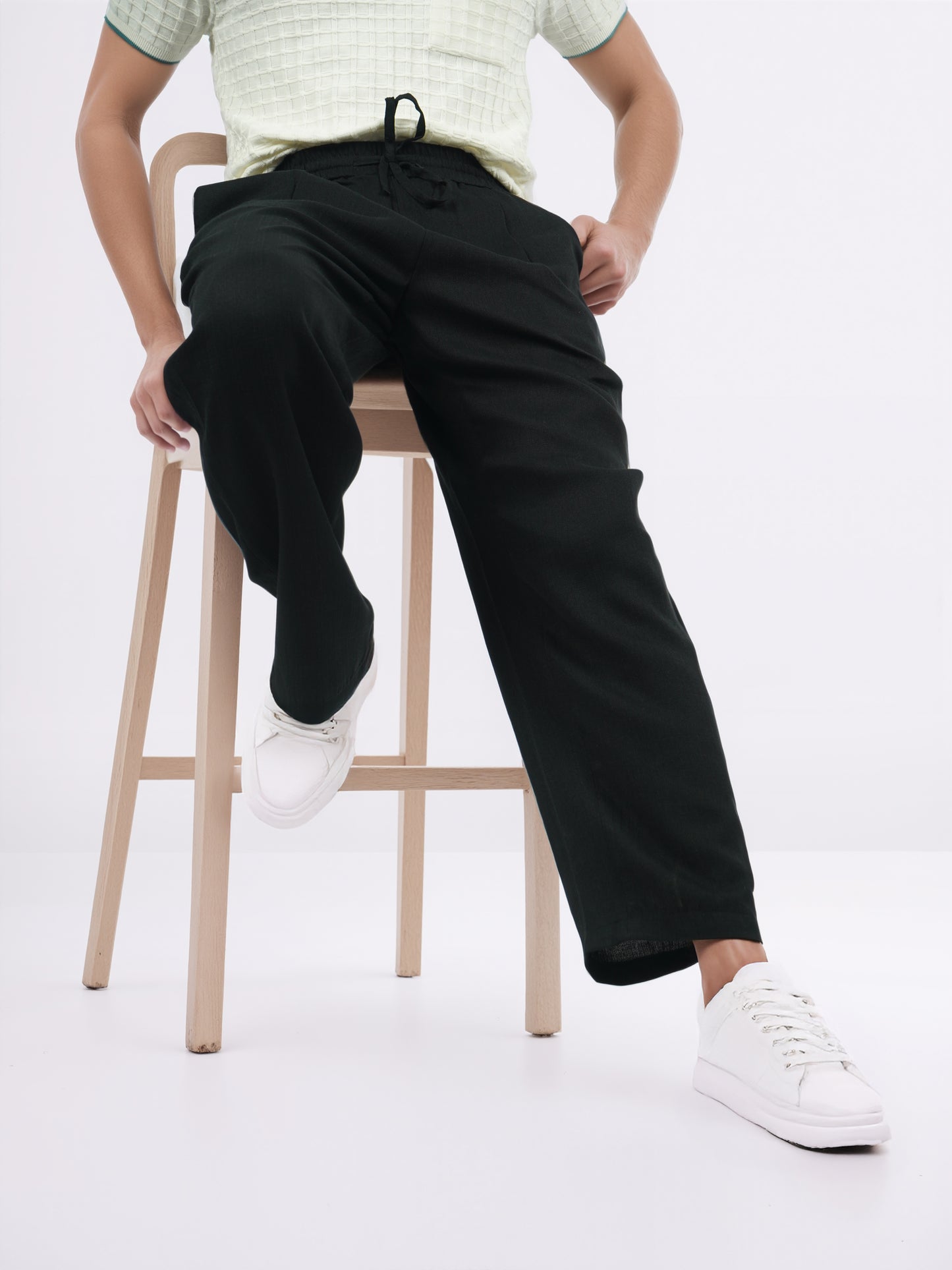 Celio* Men Black Solid Loose Fit Viscose Trousers