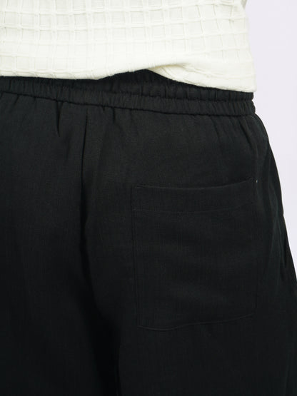 Celio* Men Black Solid Loose Fit Viscose Trousers