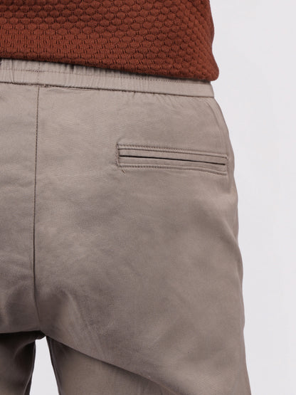 Celio Men Beige Solid Jogger Fit Cotton-Tencel-Blend Trousers