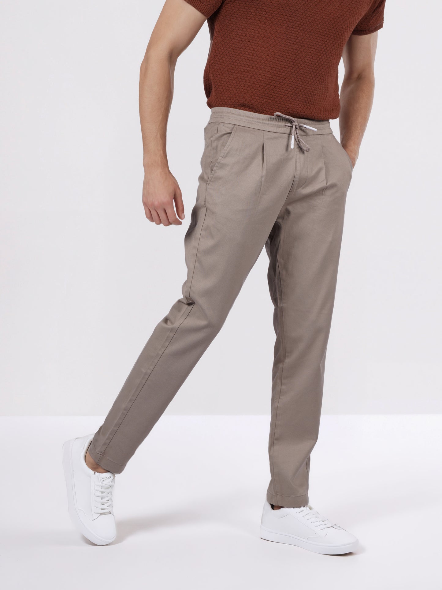 Celio Men Beige Solid Jogger Fit Cotton-Tencel-Blend Trousers