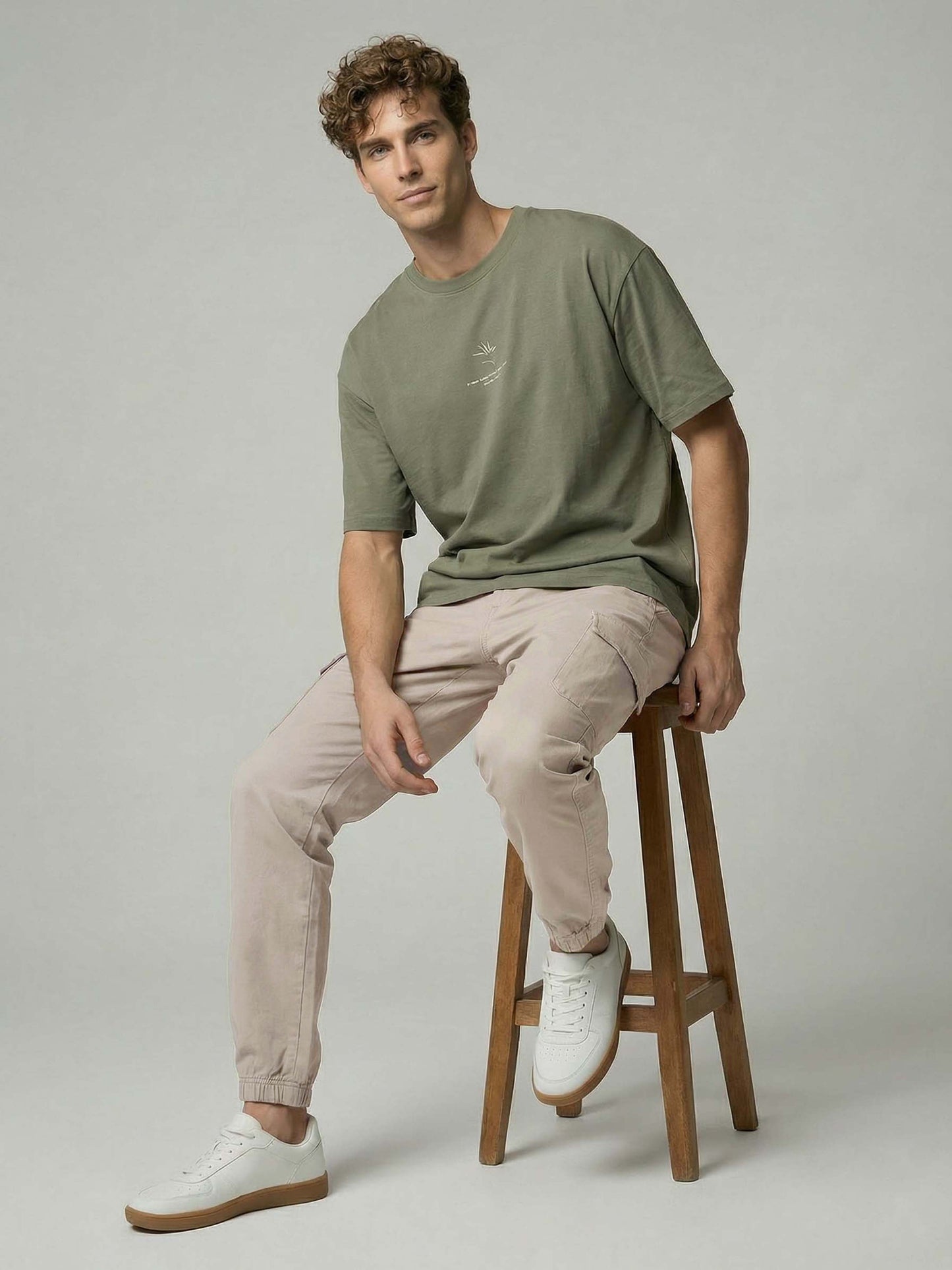 Celio* Men Beige Solid Straight Fit Cotton Trousers