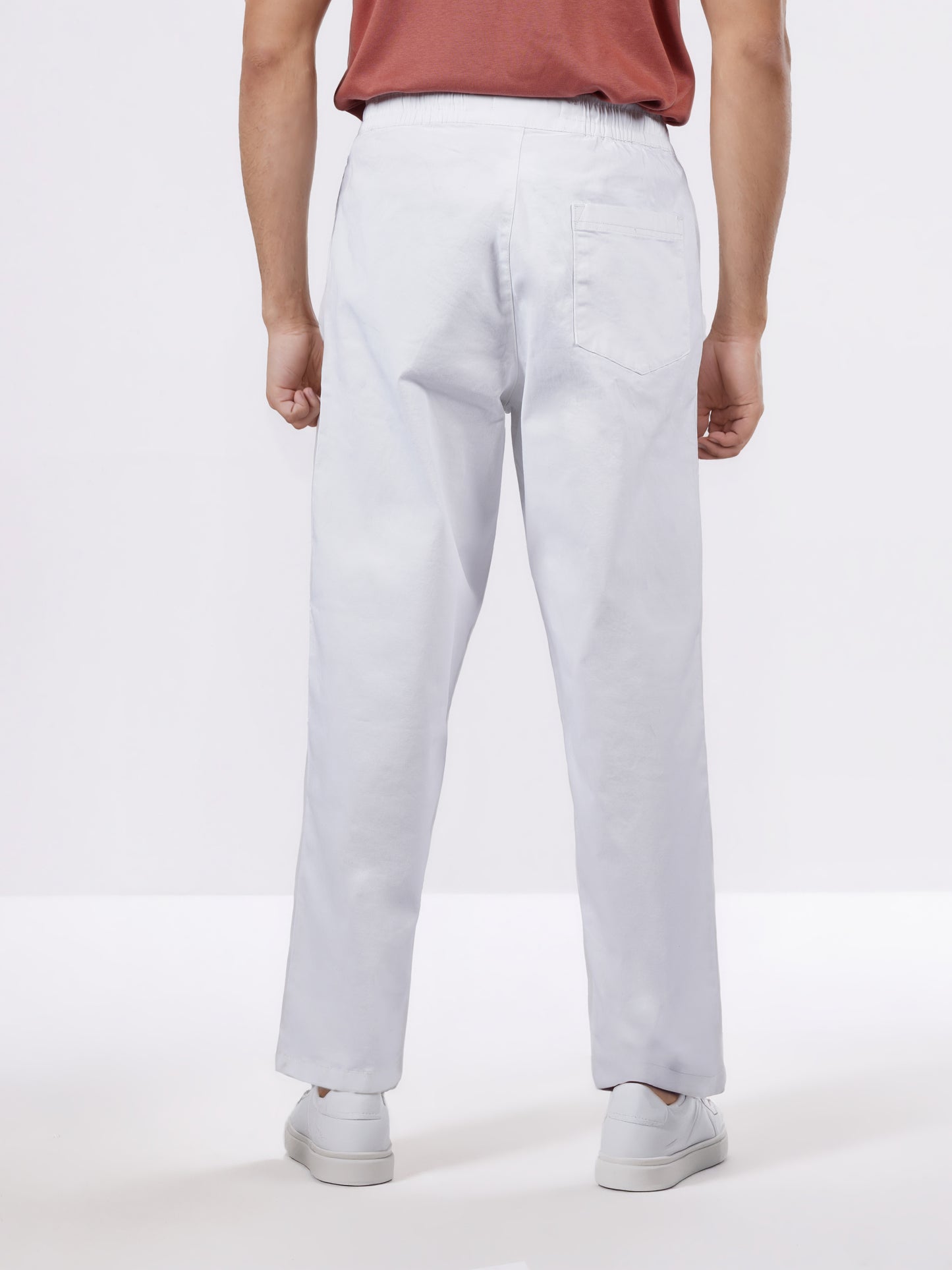 Celio* Men White Solid Loose Fit Cotton-Lycra-Blend Trousers