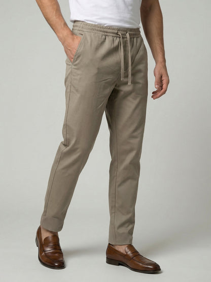 Celio Men Beige Solid Slim Fit Poly-Blend Trousers
