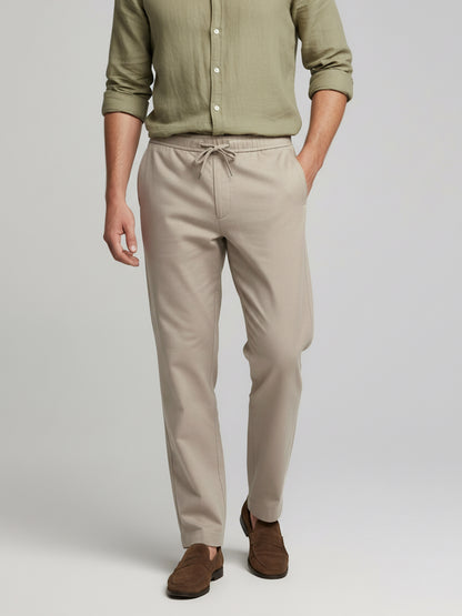 *Celio Men Beige Solid Baggy Fit Polyester Trousers