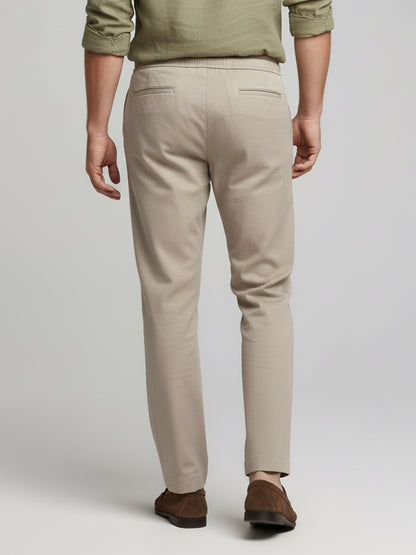 *Celio Men Beige Solid Baggy Fit Polyester Trousers