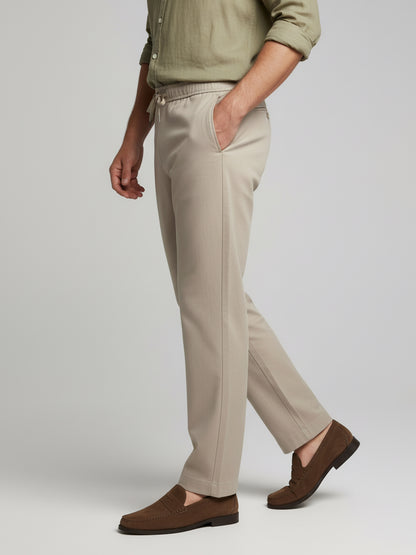 *Celio Men Beige Solid Baggy Fit Polyester Trousers