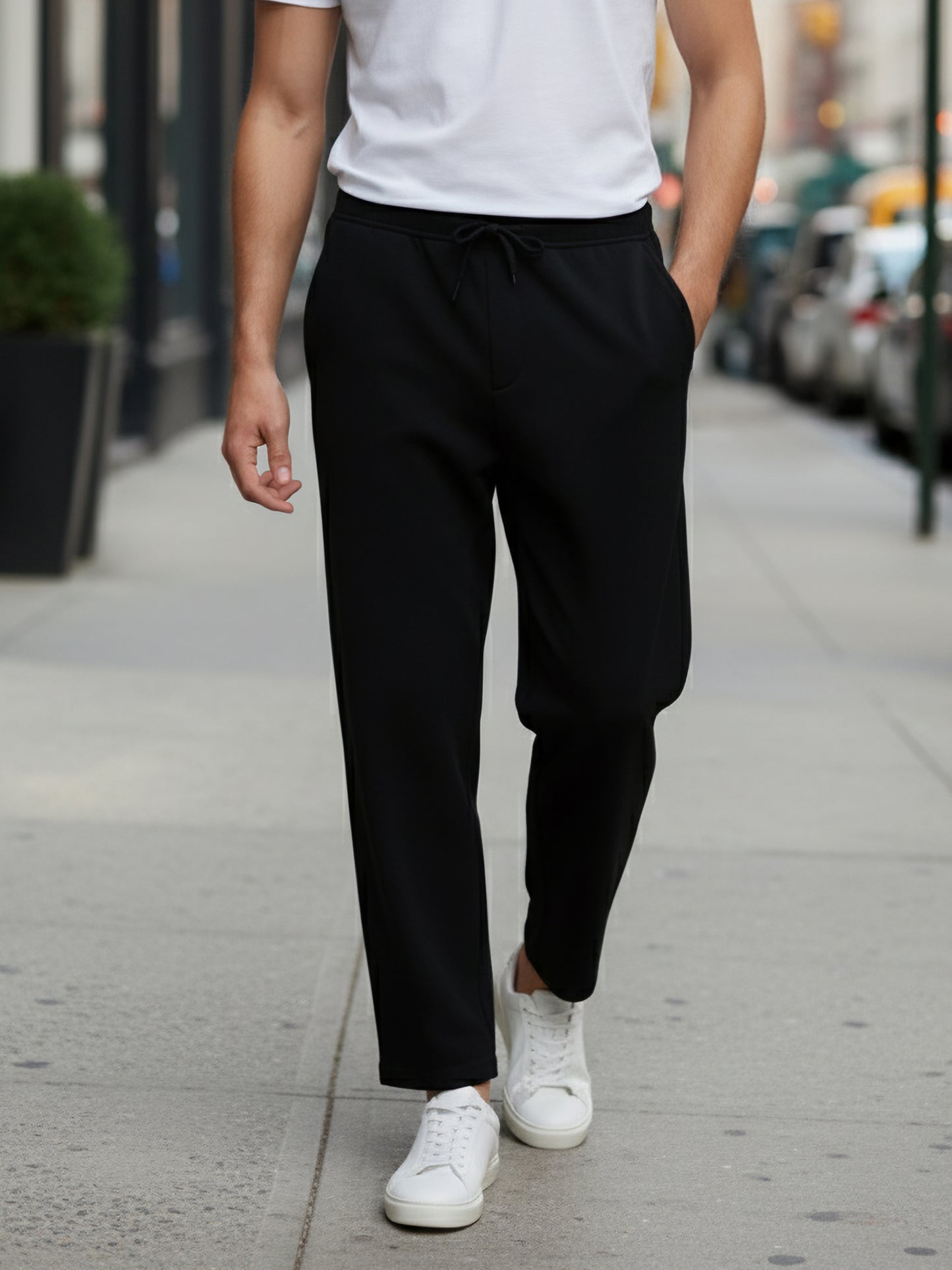 *Celio Men Black Solid Baggy Fit Polyester Trousers