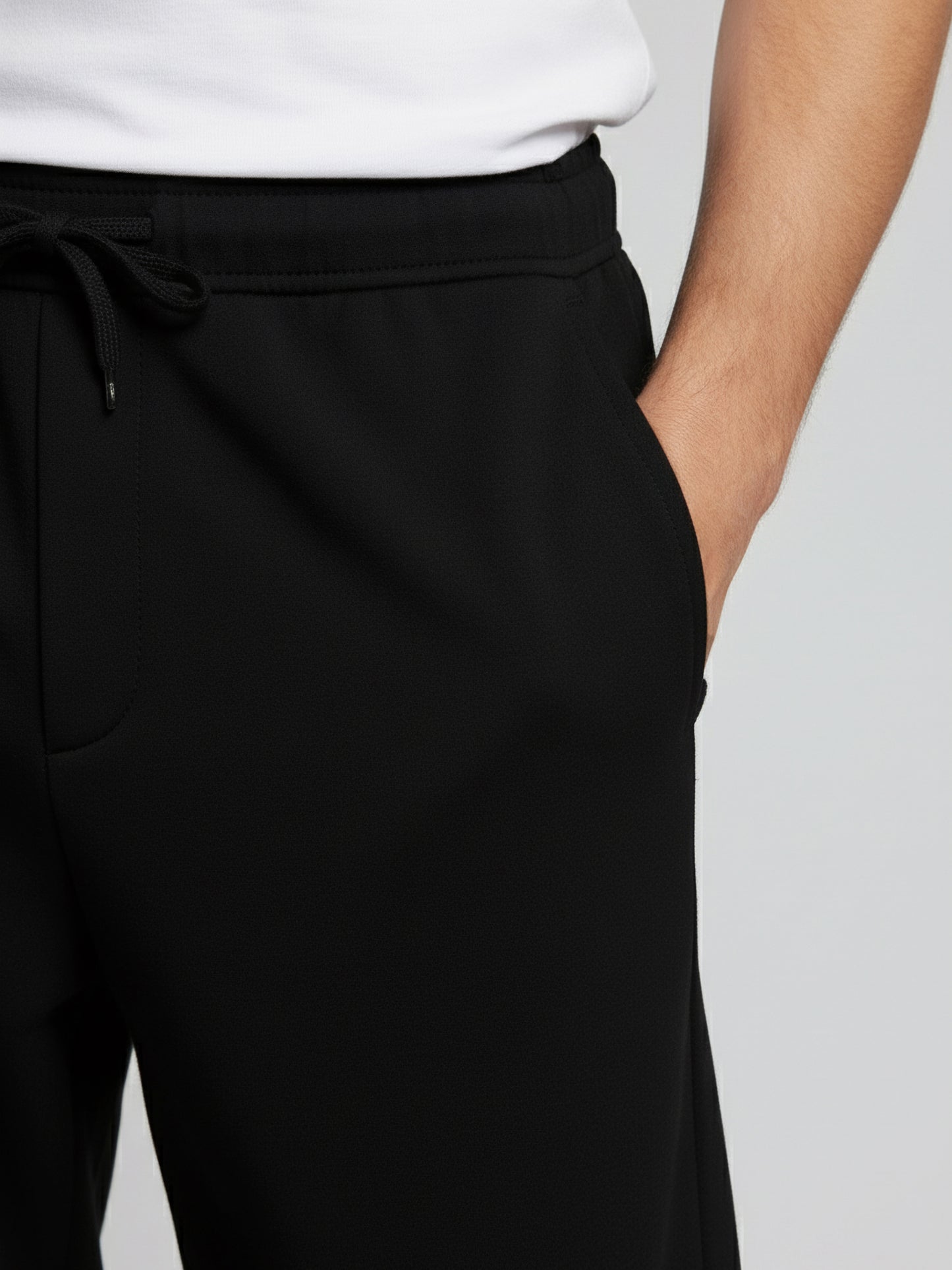 *Celio Men Black Solid Baggy Fit Polyester Trousers