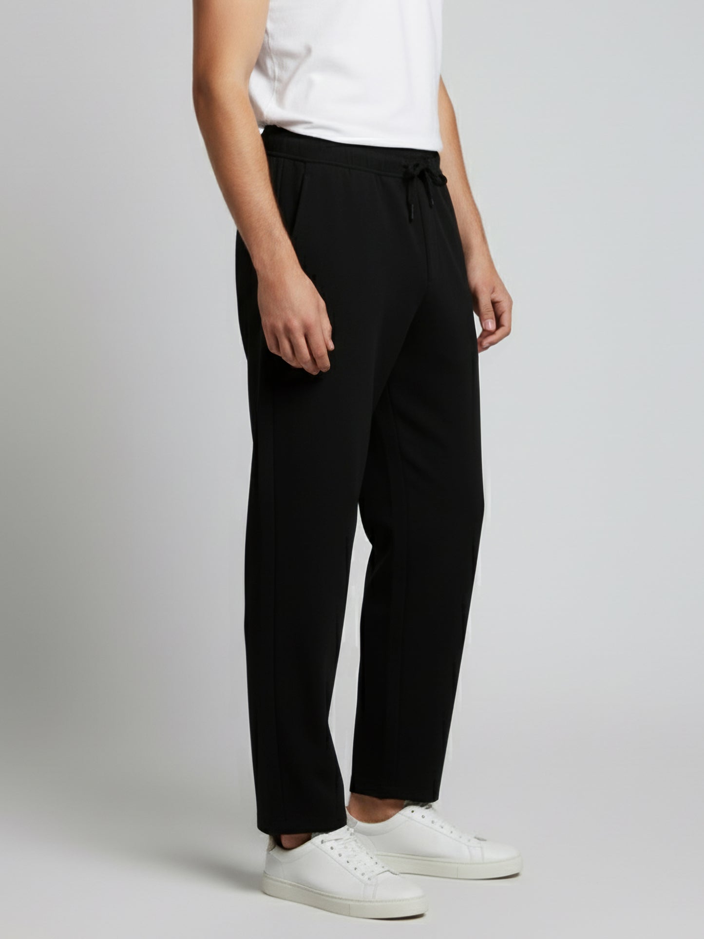 *Celio Men Black Solid Baggy Fit Polyester Trousers