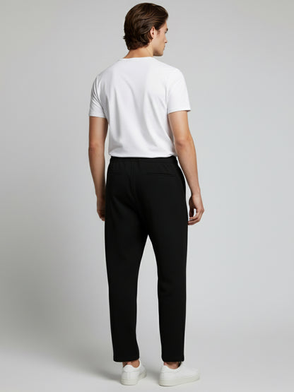 *Celio Men Black Solid Baggy Fit Polyester Trousers