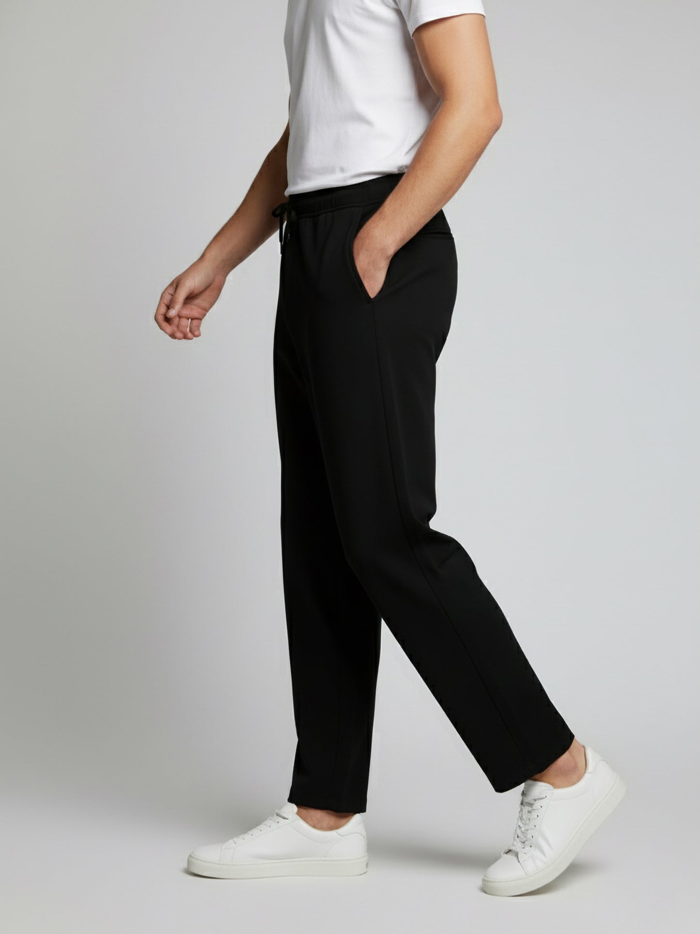 *Celio Men Black Solid Baggy Fit Polyester Trousers