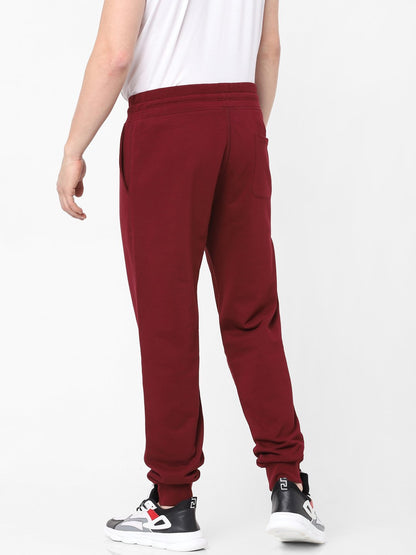 Celio* Men Burgundy Solid Jogger Fit Cotton Trousers